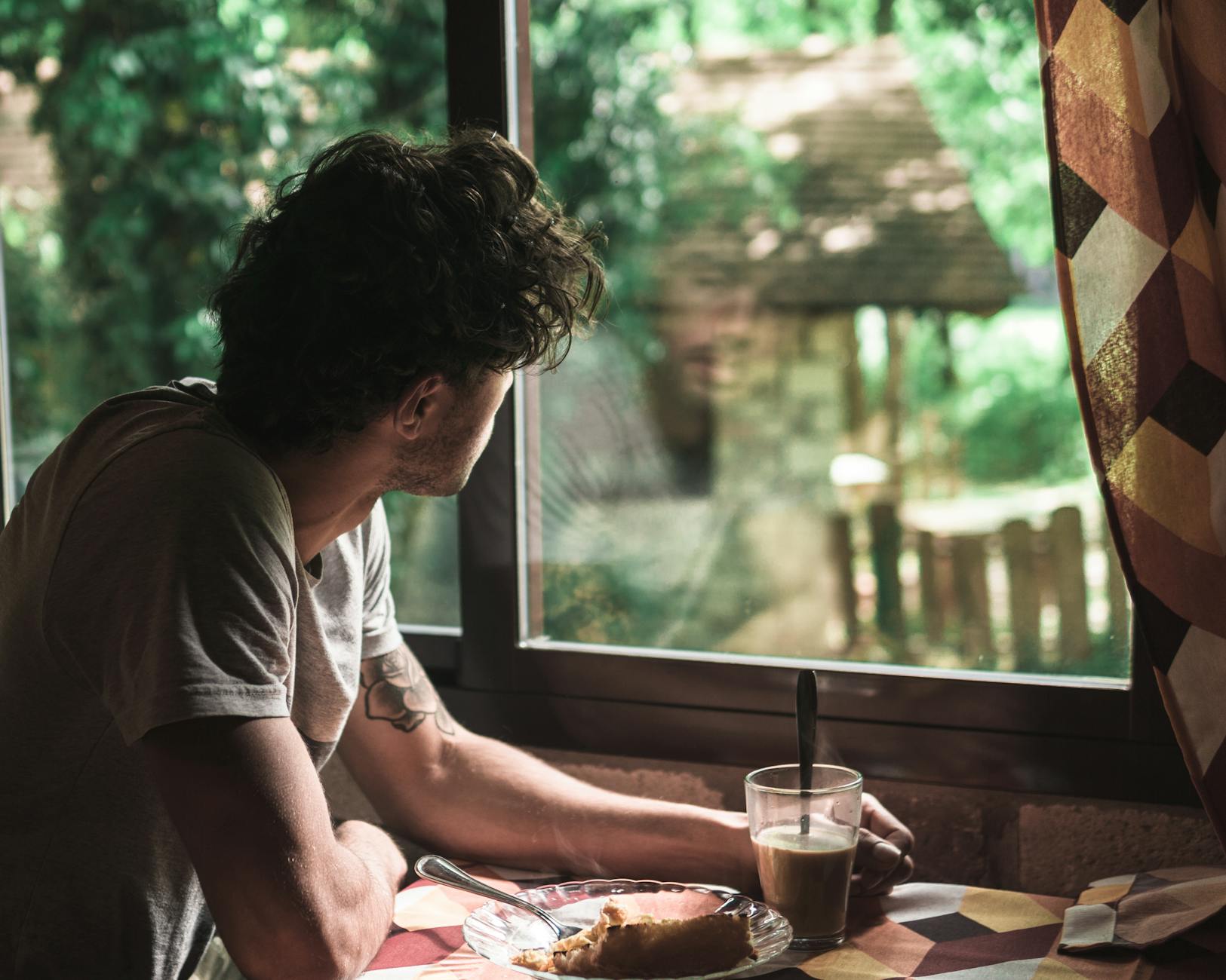 A man preparing coffee in the morning